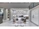 Modern kitchen with a large central island, marble accents, and stainless steel appliances creating a sleek design at 523 Overlook Rim Dr, Henderson, NV 89012