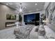Serene main bedroom with a fireplace, city views, plush bedding, and elegant lighting at 523 Overlook Rim Dr, Henderson, NV 89012