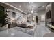 Elegant main bedroom showcasing a modern fireplace, art, plush bedding, and stylish decor at 523 Overlook Rim Dr, Henderson, NV 89012