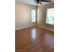 Bedroom featuring beautiful hardwood floors, natural light, and neutral walls at 533 Via Santiago St, Las Vegas, NV 89144