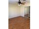 Bedroom with ample space, natural light, wood floors, and closet with sliding doors at 533 Via Santiago St, Las Vegas, NV 89144