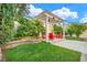 Lush backyard featuring an inviting pergola with outdoor seating and beautiful landscaping at 5553 Coral Gate St, Las Vegas, NV 89148