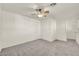 Carpeted bedroom featuring a ceiling fan and a neutral color palette at 5553 Coral Gate St, Las Vegas, NV 89148