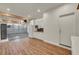 Finished garage with epoxy floors, white cabinets, and modern lighting at 5553 Coral Gate St, Las Vegas, NV 89148