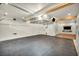 Modern garage with epoxy floors, storage cabinets, and a well-lit workspace at 5553 Coral Gate St, Las Vegas, NV 89148