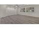 Spacious living room with hardwood floors, recessed lighting, and plantation shutters at 5553 Coral Gate St, Las Vegas, NV 89148