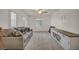 Inviting living room with gray sofa, media center, and plantation shutters at 5553 Coral Gate St, Las Vegas, NV 89148