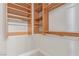 Custom closet organization featuring adjustable wood shelving and chrome closet rods at 5576 Buena Martina Way, Las Vegas, NV 89141