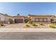Charming single story home with a desert landscape, brick driveway, and covered entry at 5576 Buena Martina Way, Las Vegas, NV 89141