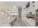 Gourmet kitchen with granite countertops, stainless appliances and custom cabinetry at 5576 Buena Martina Way, Las Vegas, NV 89141