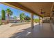 Expansive covered patio with a water feature, perfect for outdoor entertaining and relaxation at 5576 Buena Martina Way, Las Vegas, NV 89141