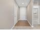 Open hallway features tile entry, plush carpeting, high ceilings and easy access to other rooms at 589 Via Paladini, Henderson, NV 89011