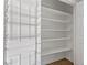 Large walk-in pantry features ample shelving and storage options at 589 Via Paladini, Henderson, NV 89011