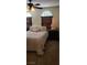 Inviting bedroom with two large windows and a comfortable bed at 5941 Alington Bend Dr, Las Vegas, NV 89139
