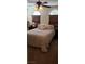 Cozy bedroom with a ceiling fan, carpet, and neutral toned bedding and blinds at 5941 Alington Bend Dr, Las Vegas, NV 89139