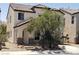 Charming two-story home featuring desert landscaping and a cozy covered porch at 5941 Alington Bend Dr, Las Vegas, NV 89139
