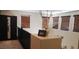 Hallway featuring several windows with wood blinds to allow for natural light at 5941 Alington Bend Dr, Las Vegas, NV 89139