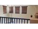 Upstairs hallway showcasing three windows with wood blinds letting in tons of natural light at 5941 Alington Bend Dr, Las Vegas, NV 89139