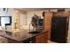 Elegant kitchen with a large island and sleek black appliances at 5941 Alington Bend Dr, Las Vegas, NV 89139
