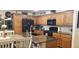 Modern kitchen with stainless steel appliances and wood cabinets at 5941 Alington Bend Dr, Las Vegas, NV 89139