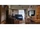 Inviting living room with comfortable furniture and a large window at 5941 Alington Bend Dr, Las Vegas, NV 89139