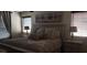 Relaxing main bedroom with neutral tones, patterned bedding, art, and natural lighting at 5941 Alington Bend Dr, Las Vegas, NV 89139