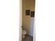 Small toilet room with neutral walls, baseboards and a plush rug at 5941 Alington Bend Dr, Las Vegas, NV 89139