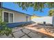 Backyard featuring a koi pond and large stone pavers at 6309 Miraloma St, Las Vegas, NV 89108