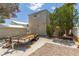Exterior backyard shot of the house, steps and trailer at 659 D Ave, Boulder City, NV 89005
