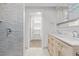 Modern bathroom features a walk-in shower and double sink vanity at 659 D Ave, Boulder City, NV 89005