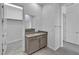Bright bathroom with vanity and walk-in closet at 6684 Regency Stone Way, Las Vegas, NV 89148