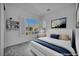 Bedroom featuring view from window and art at 6684 Regency Stone Way, Las Vegas, NV 89148