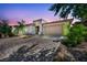Well maintained single story home with mature desert landscaping, stone accents and a spacious two-car garage at 6684 Regency Stone Way, Las Vegas, NV 89148