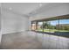 Bright living room with seamless indoor-outdoor flow to the patio at 6684 Regency Stone Way, Las Vegas, NV 89148