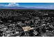 A selectively colored aerial view highlighting a home with a pool, nestled within a community, showcasing neighborhood layout and proximity at 6710 Rocking Horse Ave, Las Vegas, NV 89108