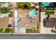 Aerial view of a single-Gathering home with a pool, large yard, and RV parking at 6710 Rocking Horse Ave, Las Vegas, NV 89108
