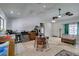 Bright kitchen and dining area with stainless steel appliances, light countertops and white walls at 6710 Rocking Horse Ave, Las Vegas, NV 89108