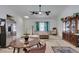 Bright kitchen and dining area with stainless steel appliances, light countertops and white walls at 6710 Rocking Horse Ave, Las Vegas, NV 89108