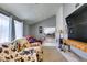 Open-concept living room, view of kitchen, bright and spacious at 6710 Rocking Horse Ave, Las Vegas, NV 89108