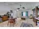 Bright kitchen and dining area with stainless steel appliances, light countertops and white walls at 6710 Rocking Horse Ave, Las Vegas, NV 89108