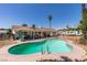 Backyard features a kidney-shaped pool, patio and RV parking at 6710 Rocking Horse Ave, Las Vegas, NV 89108
