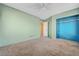 Bright bedroom with neutral walls, an open closet, and soft carpet at 6804 Tropicaire St, Las Vegas, NV 89149