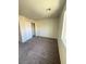 A bedroom featuring carpeted floors, a large closet, and a window at 7469 Margollini St, Las Vegas, NV 89148