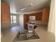 Open kitchen features a gas range stove, sink and spacious countertop area at 7469 Margollini St, Las Vegas, NV 89148