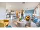 Spacious living area merges seamlessly with a modern kitchen, complete with stylish decor and ample seating at 7925 Pandora Sky St # 392, Las Vegas, NV 89084