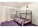 Shared bedroom with bunk beds, bright lighting, and ample natural light at 812 Pyramid Dr, Las Vegas, NV 89107
