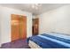 Cozy bedroom features closet space, natural lighting, and simple decor at 812 Pyramid Dr, Las Vegas, NV 89107