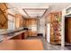 Cozy kitchen featuring wooden cabinets, laminate countertops, and essential appliances at 812 Pyramid Dr, Las Vegas, NV 89107