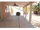 Backyard with a covered patio including an outdoor kitchen area at 825 Cornerstone Pl, North Las Vegas, NV 89031