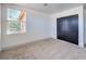Bedroom with closet and large window at 825 Cornerstone Pl, North Las Vegas, NV 89031